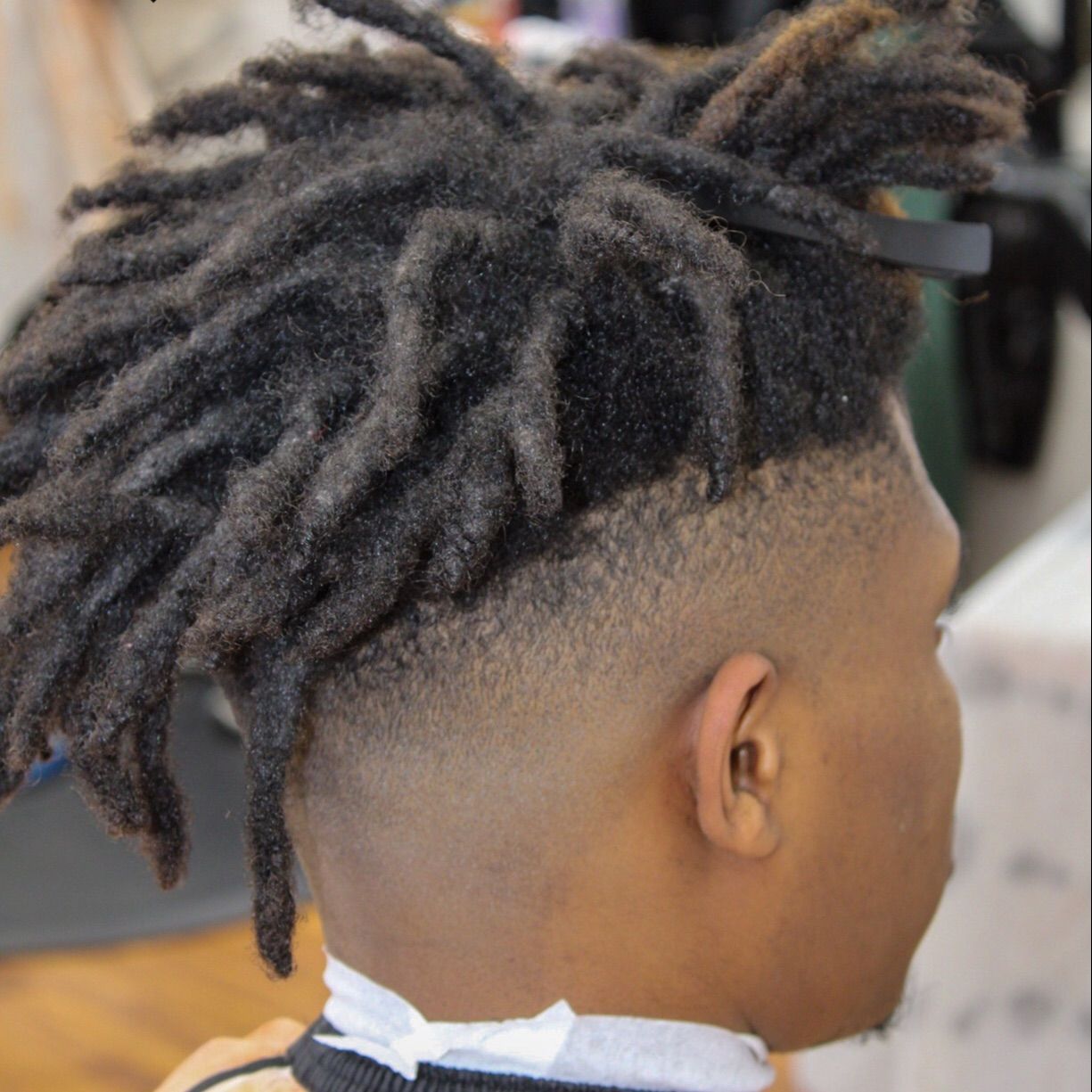 Clean taper fade with locs