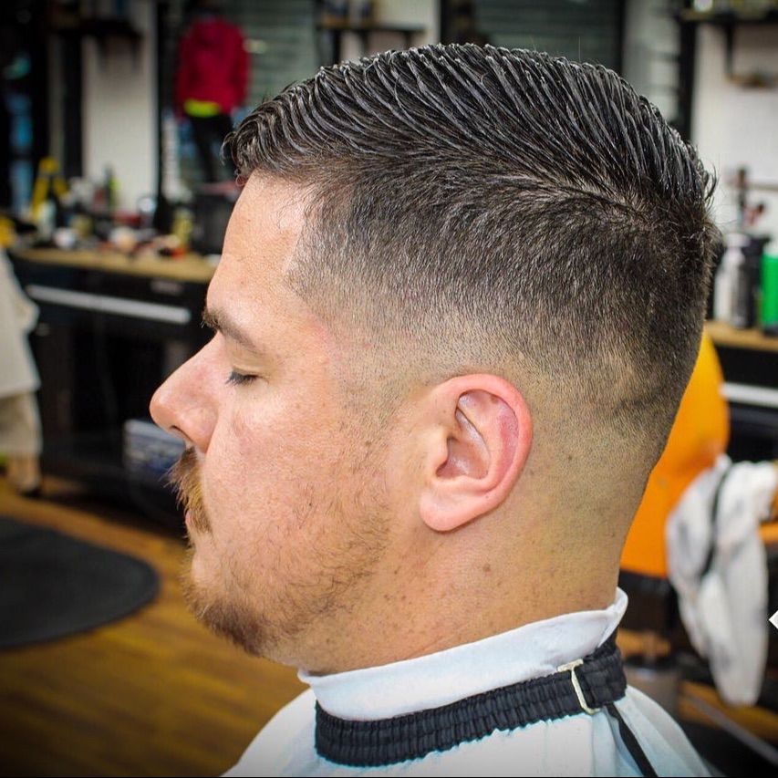 Classic side-part haircut with smooth fade