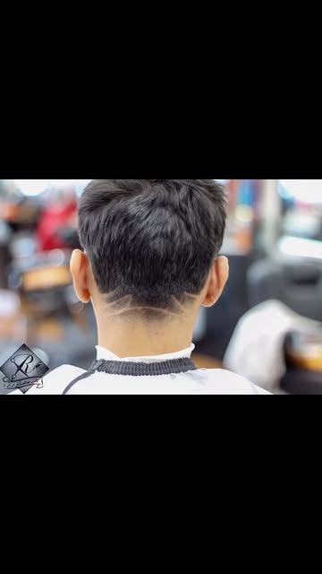 Back view of a clean tapered haircut